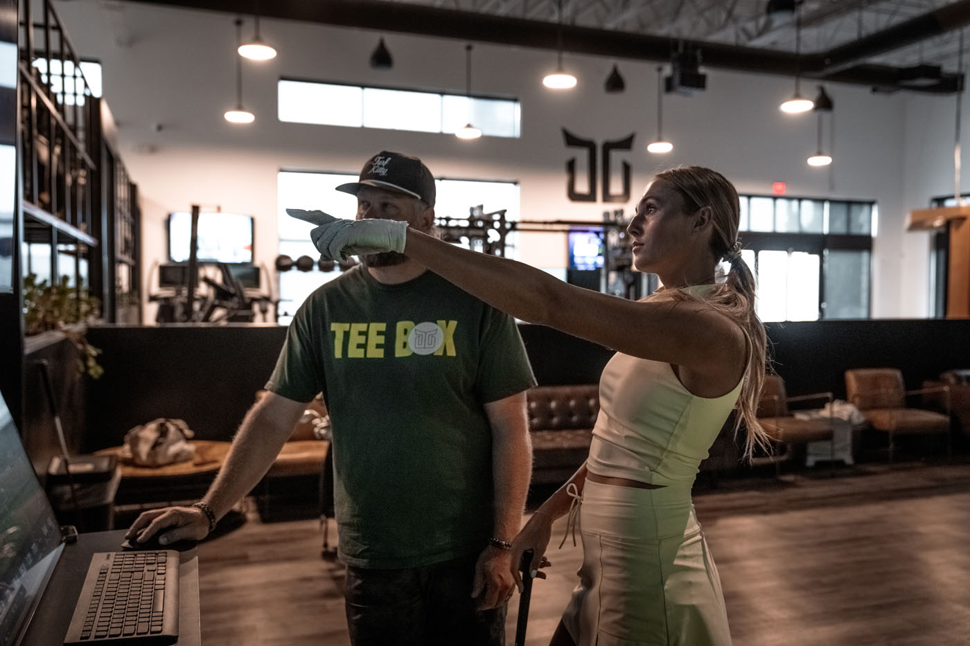 A Tee Box coach and client at our facility.